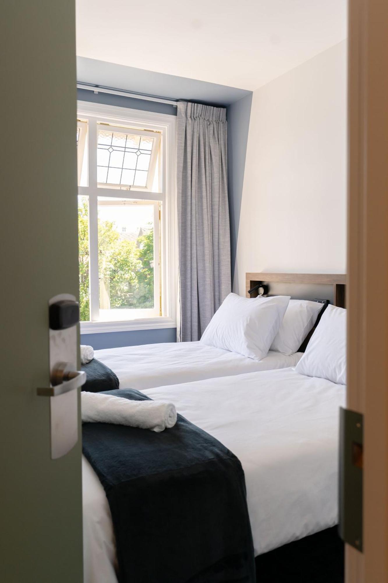 Haka House Christchurch Exterior foto A room at the hotel